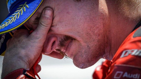Miller menangis haru atas kemenangan perdananya bersama Ducati. Sumber: Motogp.com
