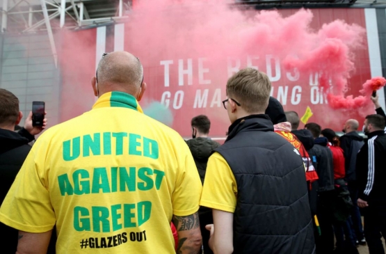 Ungkapan pencitan MU ke pemilik klub. Photo:AP/PA: Barrington Coombs