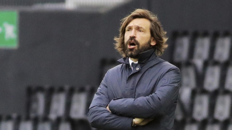 Andrea Pirlo kala memimpin Juventus dalam sebuah pertandingan - bola.com