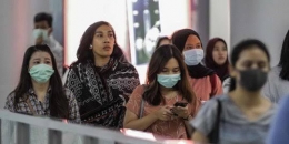 Indonesia masih jauh untuk melepaskan masker (merdeka.com)
