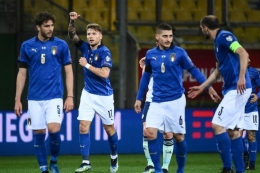 Penyerang Timnas Italia, Ciro Immobile, merayakan golnya pada laga Kualifikasi Piala Dunia 2022 kontra Irlandia Utara di Stadion Ennio-Tardini, Parma, pada 25 Maret 2021.(AFP/MARCO BERTORELLO via Kompas.com)