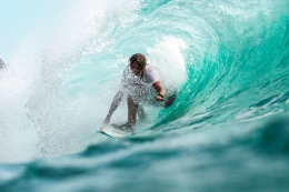 Ilustrasi surfing (Foto oleh Jeremy Bishop dari Unsplash)
