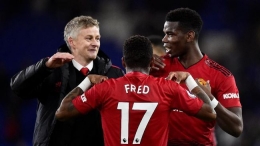 Solskjaer bersama Fred dan Pogba (Foto REUTERS/Rebecca Naden) 