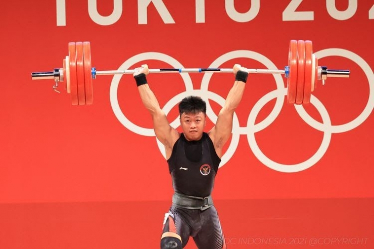 Rahmat Erwin Abdullah, meraih medali perunggu angkat besi kelas 73 kilogram (foto: Kompas.com/NOC Indonesia) 