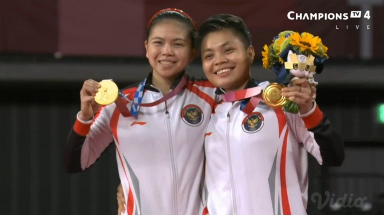 Potret Greysia Polii/Apriyani Rahayu Yang Berhasil Meraih Medali Emas Untuk Indonesia Di Cabor Bulutangkis Olimpiade Tokyo 2020 . Sumber : Badminton Talk