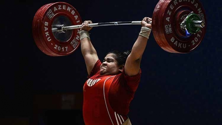 Nurul Akmal, atlet angkat besi wanita kelas berat asal Aceh yang mewakili Indonesia di ajang Olimpiade Tokyo 2020. (Sumber ilustrasi: indosport.com)
