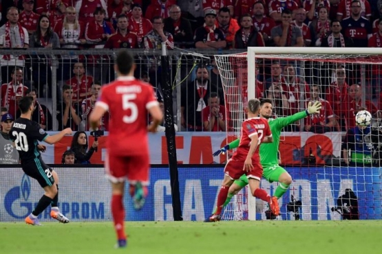 Asensio mencetak gol ke gawang Bayern Muenchen pada semifinal Liga Champions 2017/2018. Sumber: AFP/Javier Soriano