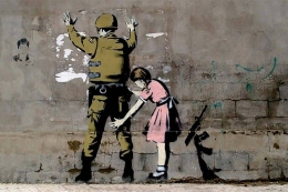 Mural karya Banksy di Betlehem (Sumber: https://laminatedposters.co.uk)