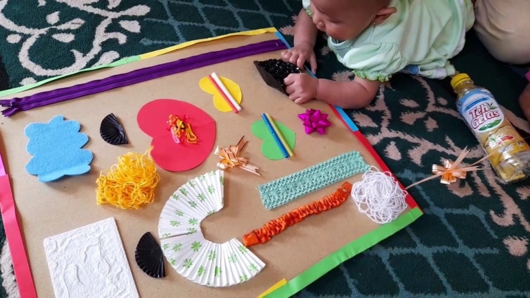 stimulasi-sensorik-melalui-sensory-board-612ae2f70101906b655cff32.jpeg