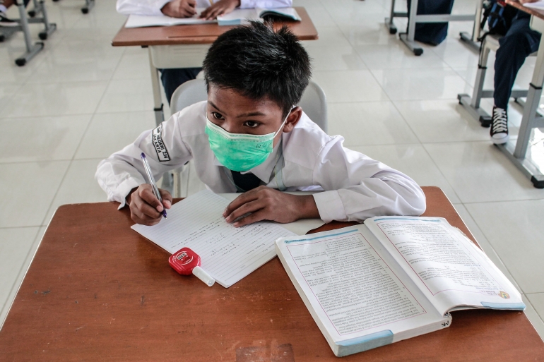 Aktivitas Pembelajaran Tatap Muka (PTM) salah satu murid SMP 236, Cakung, Jakarta Timur (Sekolah Menengah Belajar). (Jonas/Mahasiswa)