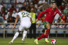 Cristiano Ronaldo dalam pertandingan Portugal vs Irlandia pada partai Kualifikasi Piala Dunia 2022 yang berlangsung di Stadion Algarve, Kamis (2/9/2021) dini hari WIB.| Sumber: AFP/CARLOS COSTA via Kompas.com