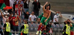 Ekpresi Ronaldo usai cetak gol ke gawang Republik Irlandia: Dailymail.co.uk