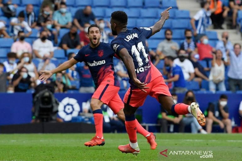 Pemain Atletico Madrid,Thomas Lemar merayakan gol kemenangan timnya atas Espanol pada pekan keempat La Liga.Foto :Josep Lago/AFP via antaranews.com