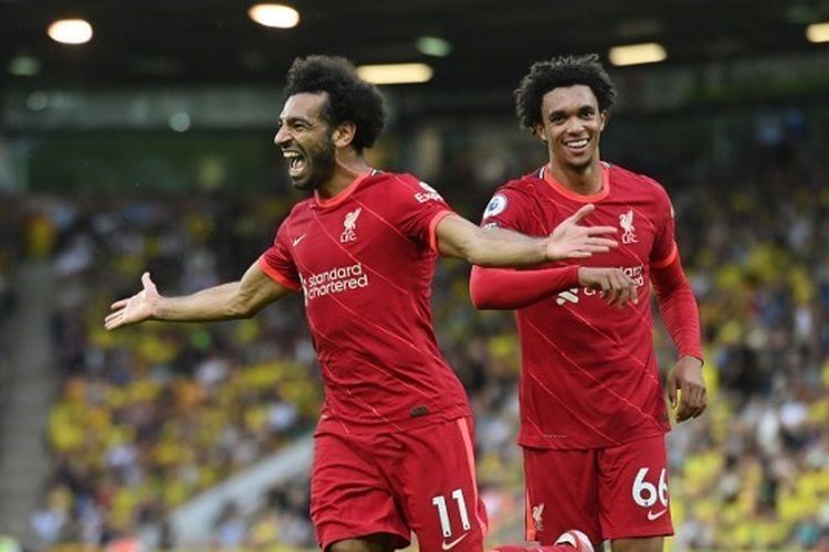 Mohamed Salah rayakan gol ke gawang Norwich City dalam laga di Stadion Carrow Road, Sabtu (14/8/2021).(AFP/JUSTIN TALLIS/via kompas.com)