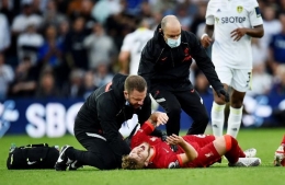 Pemain muda Liverpool Harvey Elliott mengalami cedera parah dalam laga melawan Leeds United (12/9)/REUTERS/Peter Powell 