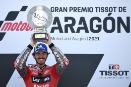 Pebalap Ducati asal Italia Francesco Bagnaia saat menjuarai MotoGP Aragon di Sirkuit Motorland di Alcaniz pada 12 September 2021.| Sumber: AFP/LLUIS GENE via Kompas.com