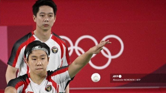 Ganda putra Indonesia Marcus/Kevin ketika berlaga di Olimpiade Tokyo 2020 kemarin (sumber: tribunnews.com)