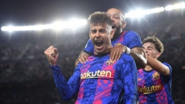 Gerard Pique merayakan gol kemenangan Barcelona atas Dynamo Kyiv. Foto:Alex Caparros/Getty Images/detik.com