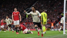 Mohamed Salah mencetak gol ke gawang MU. (Foto: Getty Images/Michael Regan)
