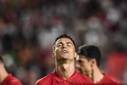Cristiano Ronaldo gagal membawa Portugal tembus langsung Piala Dunia 2022. Foto: Patricia De Melo Moreira via Kompas.com