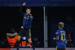 Ronaldo berselebrasi setelah mencetak gol saat Manchester United melawan Villarreal di Liga Champions. Foto: Jose Jordan via k
