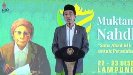 Presiden Jokowi saat memberi sambutan dalam pembukaan Muktamar NU ke-34 di Lampung. (Screenshot YouTube Sekretariat Presiden)