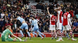 Ekspresi kecewa para pemain Arsenal usai ditundukkan Manchester City.Foto:Ian Kington/AFP/tribunnews.com