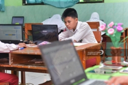 Ilustrasi siswa SD belajar dengan laptop. Foto dokumen madiuntoday