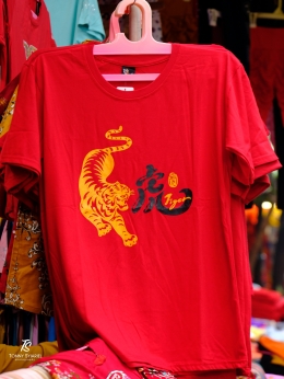Kaos dengan logo Macan Air yang lagi laris. Sumber: Dokumentasi pribadi