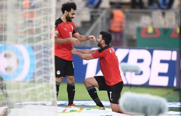 Mohamed Salah merayakan kemenangan Mesir atas Maroko.Foto:Charly Triballeau/AFP/kompas.com