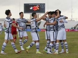 Pemain timnas Korea Selatan merayakan keberhasilan lolos ke Piala Dunia 2022/foto: sportsmole.co.uk