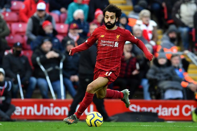 Penyerang Liverpool, Mohamed Salah, beraksi saat melawan Watford di Stadion Anfield, Sabtu (14/12/2019).(AFP/PAUL ELLIS via Kompas.com)