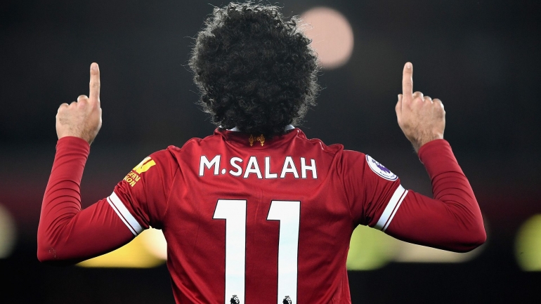Gestur khas Mohamed Salah dalam merayakan gol yang dicetaknya. (Sumber: Sporting News Online)