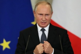 Presiden Rusia Vladimir Putin.| Sumber: AFP/SERGEI CHIRIKOV/POOL via Kompas.com