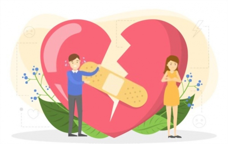 Couple standing big red broken heart | Sumber. Shutterstock