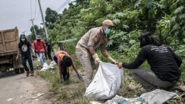 Aksi bersih sampah warga Morowali di HPSN 2022. Sumber foto: Kumparan/Palu Poso