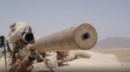Wali, a former Canadian Forces sniper, is seen here with his rifle in Kandahar in 2009. (CBC News). Screen shoot  from  cbc.ca edisi 4 Maret 2022.