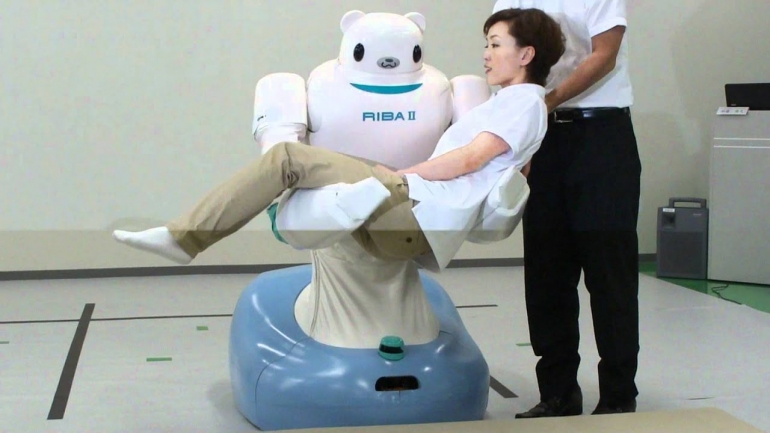 RIBA (Robot for Interactive Body Assitance), robot buatan Jepang yang salah satunya berfungsi membantu mengangkat pasien (vevnews.blogspot.com) 