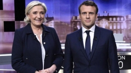  Dua  calon Presiden Perancis Marie Le Peen dan Macron dipilih tanggal 24/04/2022( Foto:Eric Feferberg / POOL / AFP) via tribunnews.com. 