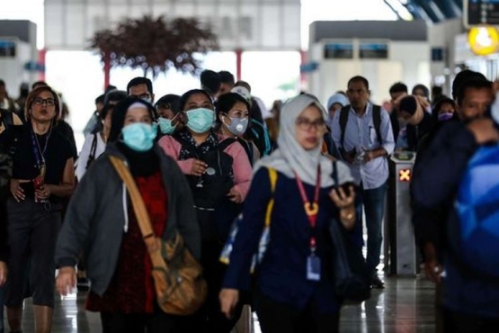 memakai masker adalah jalan ninja (KOMPAS.com/GARRY LOTULUNG) 