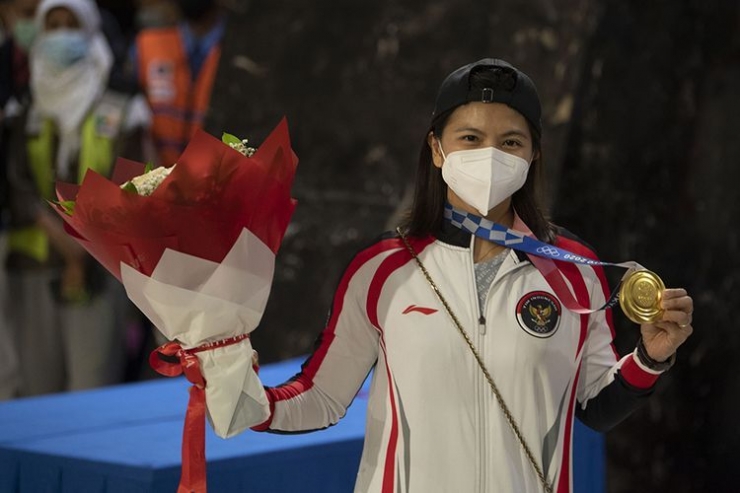 Greysia Polii meraih medali emas Olimpiade Tokyo 2020 bersama Apriyani Rahayu: ANTARA FOTO/ADITYA PRADANA PUTRA via Kompas.com