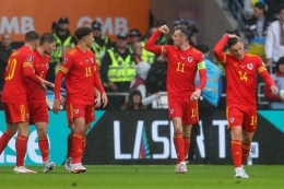 Gareth Bale dan timnas Wales merayakan kelolosan ke Piala Dunia 2022.Foto:Geoff Caddick/AFP/kompas.com