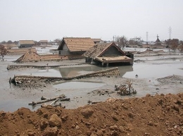Rumah warga yang terendam lumpur, Arifhidayat via Commons Wikipedia