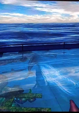 Suasana di dalam wahana interaktif Samudra Raksa dengan layar yang menampilkan lautan dan isinya (foto: Yana Haudy)
