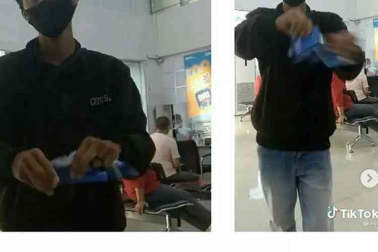 Aksi pemuda asal Lampung yang videonya viral saat sedang merobek buku tabungannya, sumber ; kompas.com