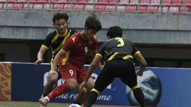 Vietnam vs Malaysia pada semi final Piala AFF U19 2022 (Foto Antara/Fakhri Hermansyah). 