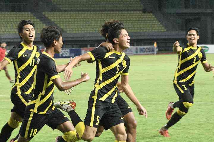 Timnas Malaysia, Harimau Muda U-19 Melakukan selebrasi usai menjebol gawang Timnas Laos di Menit ke 14, Sumber: tempo.co