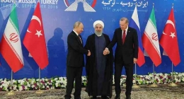 Putin, Presiden Iran Ebrahim Raisi dan Presiden Turki Recep Tayyip Erdogan  (kredit foto: Sputnik/Sergei Savostyanov/Pool/via Reuters)