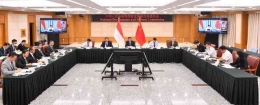 He Li Peng komisi pembangunan Nasional melalui  teleVideo konperensi dengan Menko Kelautan/investasi | foto: f.sinanews/cn