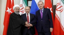 Presiden Turki Recep Tayyip Erdogan, Presiden Rusia Vladimir Putin, dan Presiden Iran Hassan Rouhani di Ankara, Turki, 16 September 2019. Foto/REUTERS